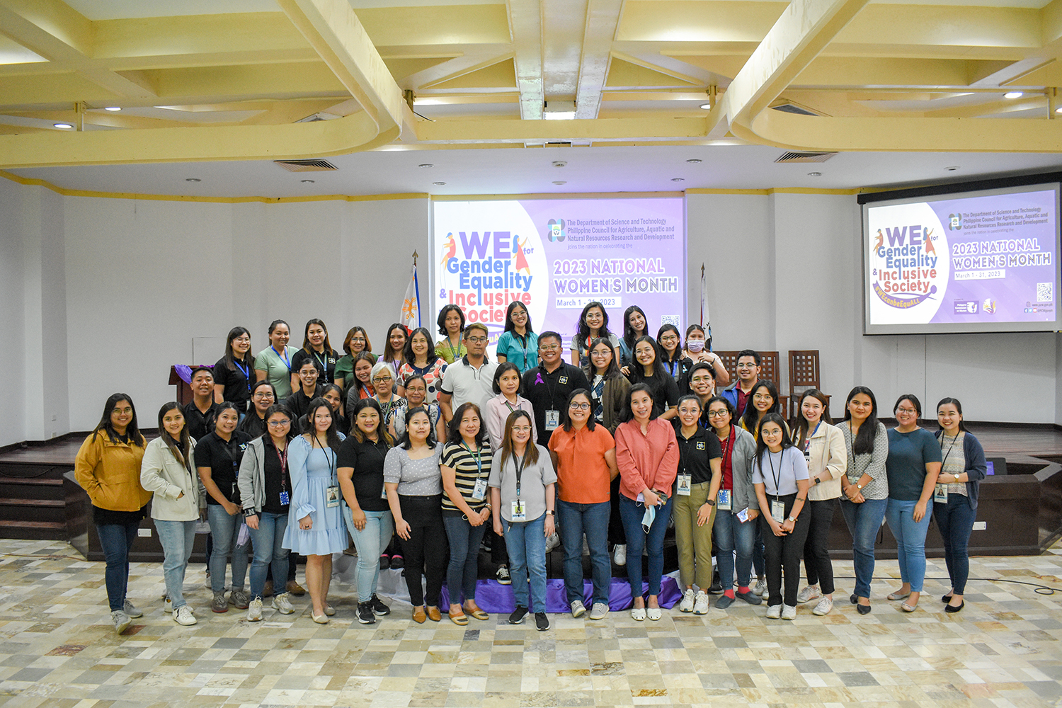 DOST-PCAARRD staff attends the program for a film showing and awarding of collage winners in participation to WMC 2023